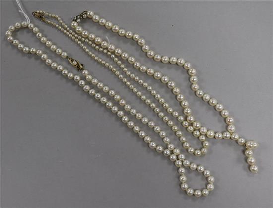 A Mikimoto single strand cultured pearl necklace with 14ct gold clasp and two other single strand cultured pearl necklaces